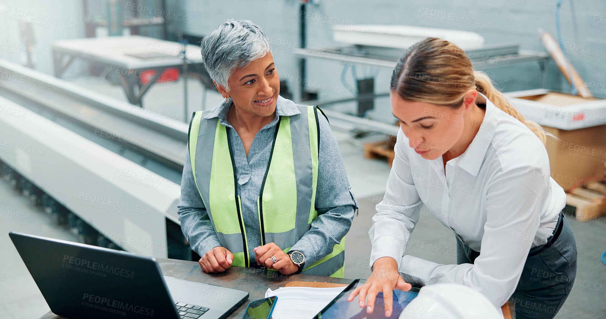 Buy stock photo Engineer team, women and technology in meeting for planning, discussion or communication at factory. Female employees, collaboration and brainstorming for robotics with internet, software or research