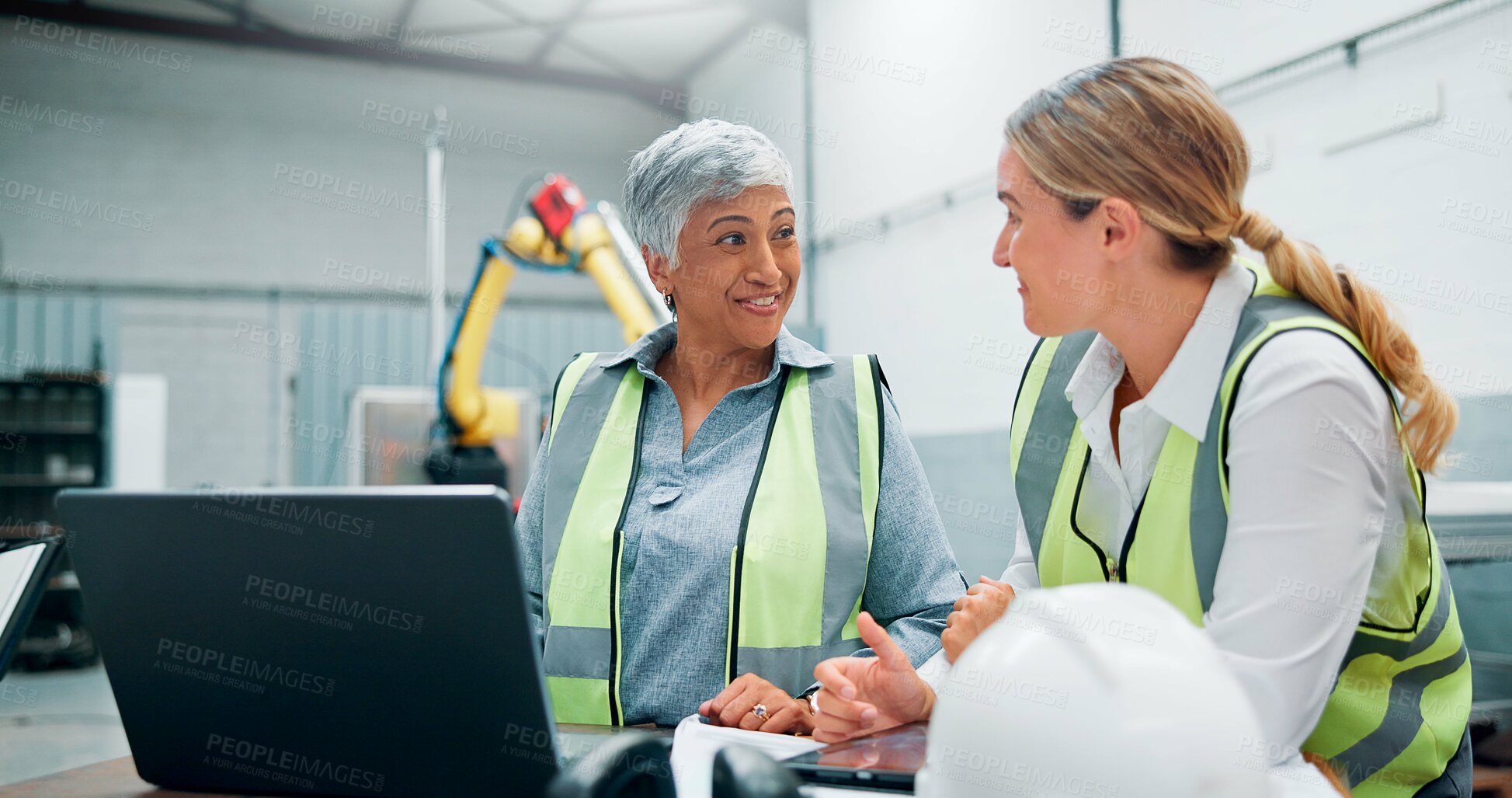 Buy stock photo Women team, engineer and technology in meeting for planning, talking or communication at factory. Female employees, collaboration and brainstorming for robotics at warehouse for innovation software