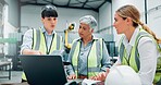 Engineer women, teamwork and laptop in meeting for planning, discussion or communication at factory. Female employees, collaboration and problem solving for robotics with software programming