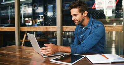 Buy stock photo Laptop, man and freelancer reading in coffee shop for article, update review or journalist check email. Computer, remote work and happy person in cafe to research news, report or editing headline