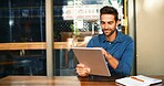 Cafe, man and editing on tablet for remote work, article information or online blog for publication. Coffee shop, male person and content writer with digital for freelancer, newsletter and reading