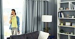 Woman, relax and drinking coffee on sofa for morning, beverage or warm comfort at home. Female person, cup or thinking with mug of caffeine on living room couch for daydreaming or wonder at house