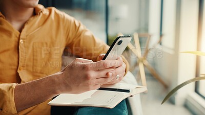 Buy stock photo Phone, notebook and hands of man in home for finance journal, planning or investment information. Cellphone, diary and male person with research for online banking on mobile app in apartment.