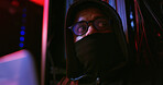 Thinking, man and hacker with laptop for cybersecurity,, programming or website breach. Software attack, late or spy with mask in dark room for big data research, system leak or online scam operation