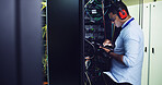 Man, engineer and database on tablet in server room for software, update system and testing. Programmer, digital and IT inspection for technical engineering, network security and hardware maintenance