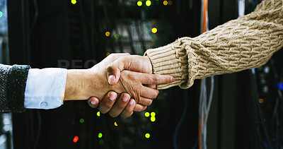 Buy stock photo Business people, handshake and deal with agreement in server room for IT service or partnership. Closeup, technician or engineer shaking hands with b2b for teamwork or network security in datacenter