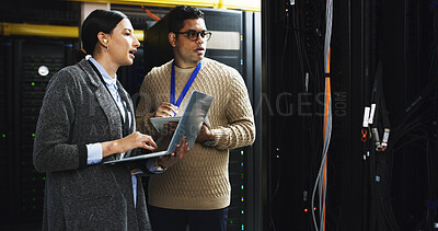 Buy stock photo People, laptop and tablet with team in server room for technical support, software update or online maintenance. Talking, collaboration and upgrade with information technology solution in data center
