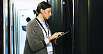 Woman, engineer and tablet in server room for software, update system and diagnostics repair. Programmer, digital and IT inspection of technical engineering, network security and hardware maintenance