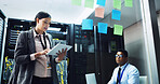 Woman, tablet and planning with man in server room, discussion and notes for IT solution at company. People, cybersecurity and hardware with tech, app and information technology for diagnostics test
