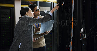 Buy stock photo People, laptop and tablet with teamwork in server room for technical support, software update or maintenance. Inspection, upgrade and work together for information technology solution in data center