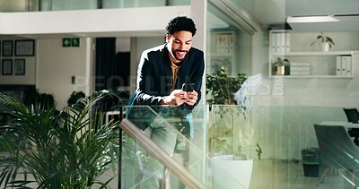 Buy stock photo Business man, happy and texting at startup with smile for contact, lead or notification at office. Person, smartphone and excited with mobile app, chat or deal for funding approval at creative agency