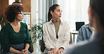 Woman, talk and support group with therapy in workplace for mental health, listen and empathy at office. Business people, discussion and circle for solidarity, counselling session and guidance
