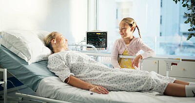 Buy stock photo Smile, child and visit mother at hospital for support, medical recovery and post surgery. Happy, kid and consoling of sick woman in bed after operation, healthcare services and healing from procedure