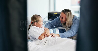 Buy stock photo Happy, holding hands and mother with child in hospital with visit for support, bonding or recovery. Smile, love and mom having fun with girl kid for healthcare or rehabilitation in medical clinic.