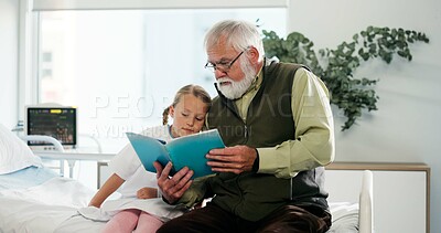 Buy stock photo Grandfather, sick girl and reading book in hospital for support, love and fantasy. Medical visit, child and senior man storytelling in clinic for kindness, comfort or patient in rehabilitation care
