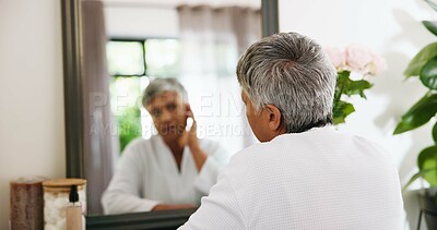 Buy stock photo Back, mirror and senior woman with skincare, wrinkles and anti aging with wellness. Home, pensioner and elderly person with reflection, morning routine and grooming with healthy skin and cosmetics