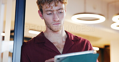 Buy stock photo Man, tablet and scroll at startup, review or thinking with notes, agenda and low angle at office. Person, tech and click app for report, feedback or insight for project management at creative agency