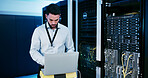 Cybersecurity, upgrade and man with laptop, coding or check server performance and network engineer. Data center, IT specialist and person with tech for software update, power cables and electricity