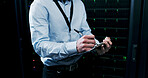 Hands, clipboard and writing in server room for information technology, solution or feedback at company. Person, programmer and checklist with notes, review and inspection for cybersecurity at agency