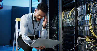 Buy stock photo Frustrated man, headache or stress with laptop in server room for network failure or system error. Male person, IT technician or mistake with anxiety on computer for security fault or troubleshooting