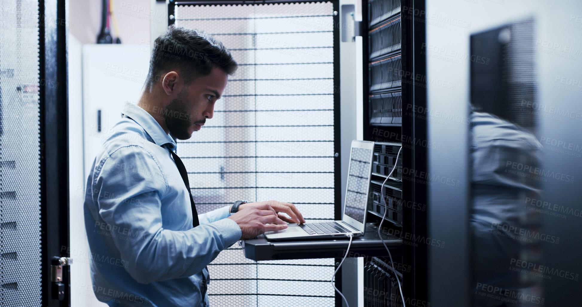 Buy stock photo Online, cybersecurity and man with laptop, coding and check server performance and network engineer. Data center, IT specialist and person with tech for software update, power cables and electricity