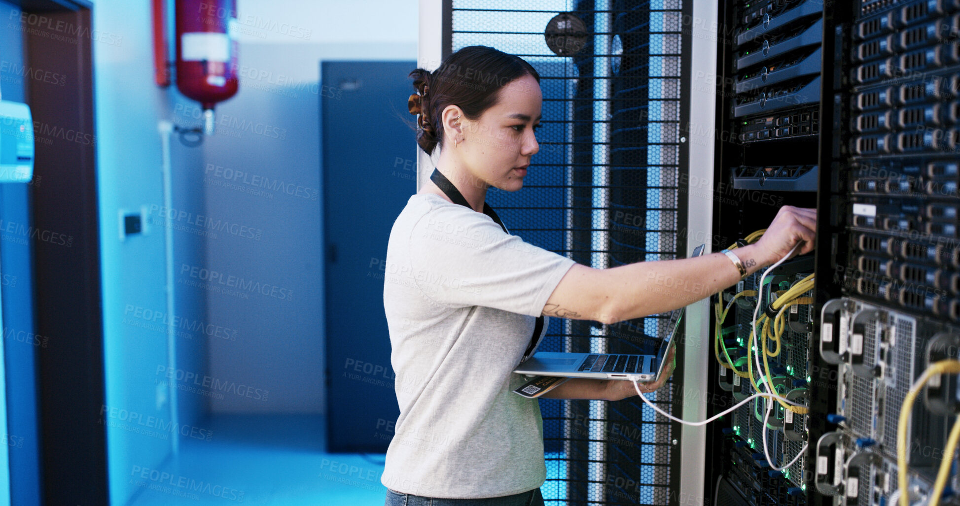 Buy stock photo Woman, laptop and cable inspection in server room, coding and checklist for IT solution at company. Person, cybersecurity and assessment with computer, hardware and information technology at agency