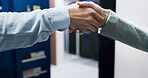 Business people, handshake or deal with agreement in server room for thank you or partnership. Closeup, technician or engineer shaking hands with greeting or welcome for connection or network service