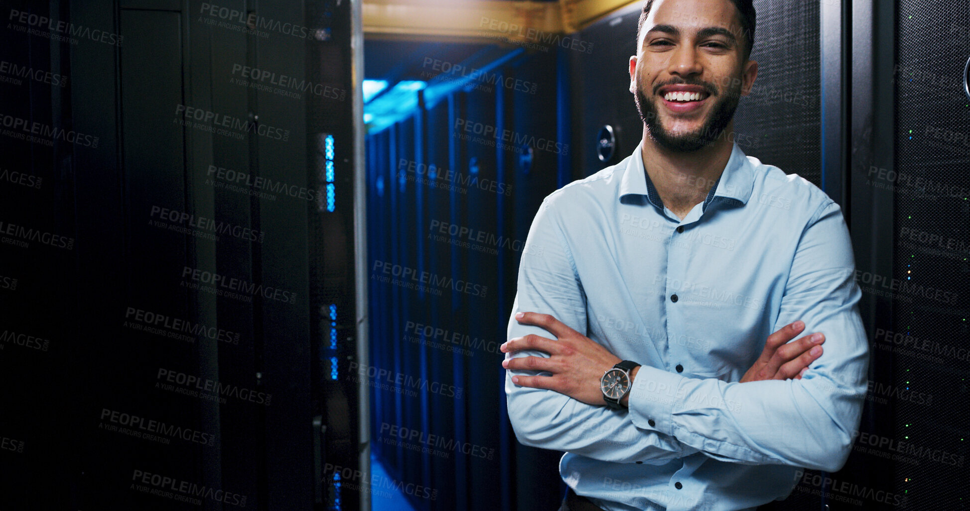 Buy stock photo Man, arms crossed and smile in server room for portrait, confidence or career at IT company. Person, developer and happy with information technology at data center, storage or cybersecurity in Mexico