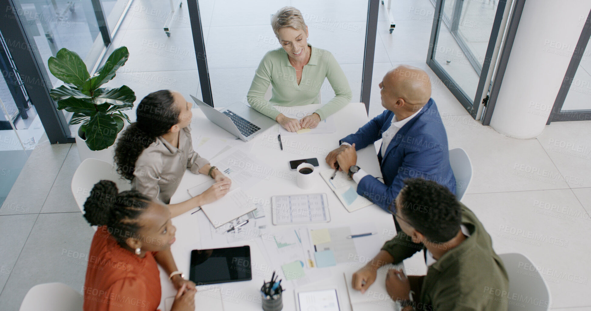 Buy stock photo Top view, finance paperwork or business people in office for development, planning or teamwork. Talking, document or financial analysts in meeting for solution, brainstorming or collaboration project