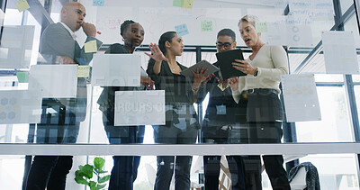 Buy stock photo Documents, team and scrum with business people in meeting for research, technology and sales projections. Collaboration, low angle and account portfolio with employees in office for proposal planing