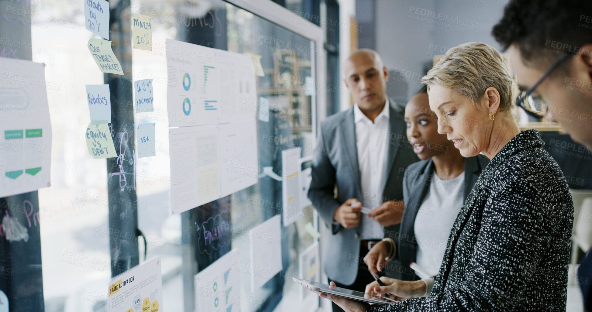 Buy stock photo Documents, team and tablet with business people in meeting for research, data chart and sales projections. Partnership, planning and account portfolio with employees in office for proposal and ceo