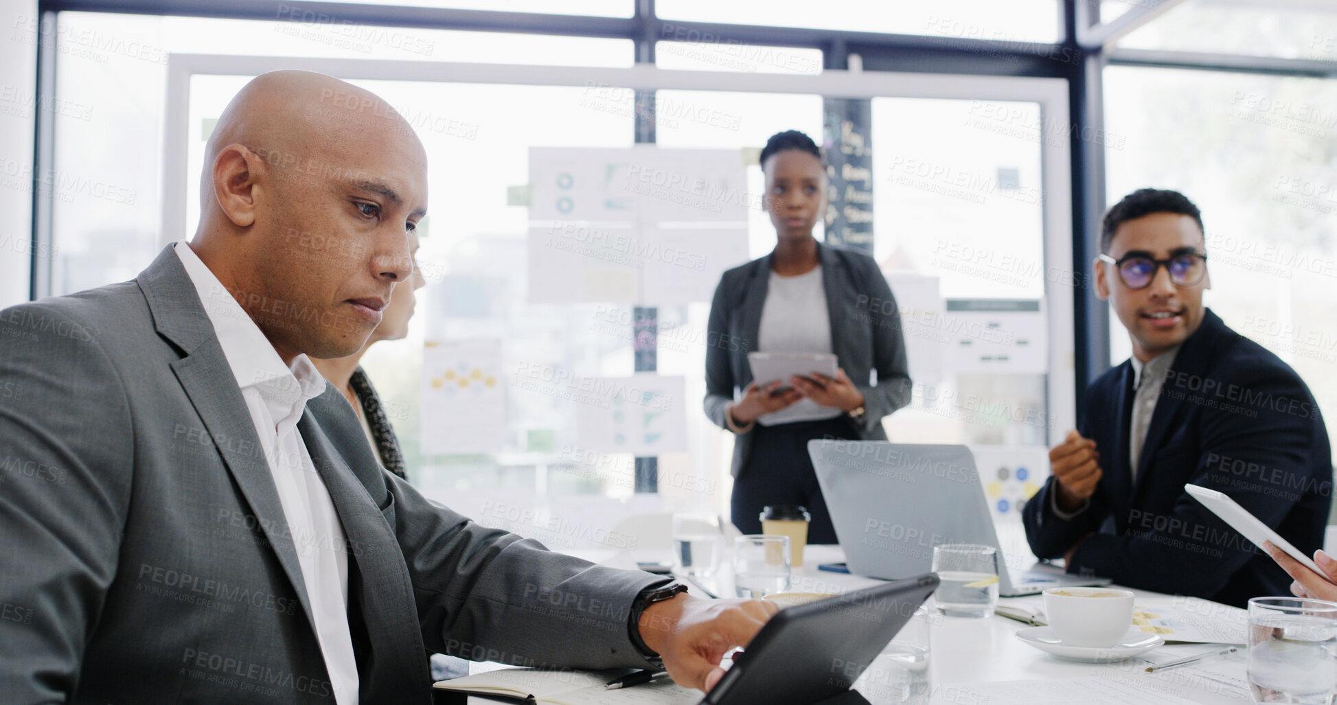 Buy stock photo Presentation, meeting and business people in office with technology, graphs or charts for finance report. Discussion, board and team of financial advisors with statistics for investment proposal.