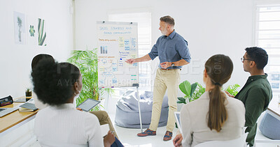 Buy stock photo Man, presentation and discussion at meeting with board for equity review, graphs or stats. Mature person, speaker and point for planning, team and sales strategy with feedback for debt at office