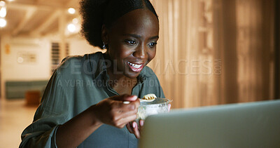 Buy stock photo Smile, black woman and night with laptop at house for research, proofreading article and multitasking. Journalist, food and pc for reading story, check facts and information for publication deadline