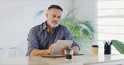 Buy stock photo Editor, office and mature man on tablet for proofreading, review or news report in agency. Creative, story and journalist editing in startup for magazine blog, article and research with technology