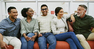 Buy stock photo Break, diversity and laughing with business people on sofa in office lounge for bonding or conversation. Comfortable, funny and relax with employee friends in workplace together for collaboration