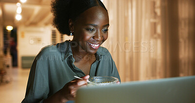 Buy stock photo Night, black woman and reading on laptop at house for research, proofreading article and multitasking. Journalist, food and PC for story feedback, check facts and information for publication deadline