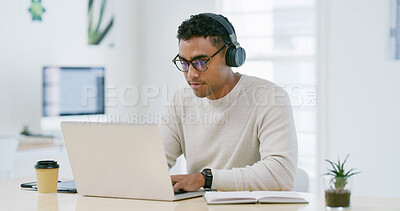 Buy stock photo Reading, laptop and headphones with business man in office for learning, webinar and demo walkthrough. Policy training, online orientation or streaming with person in agency for professional upskill