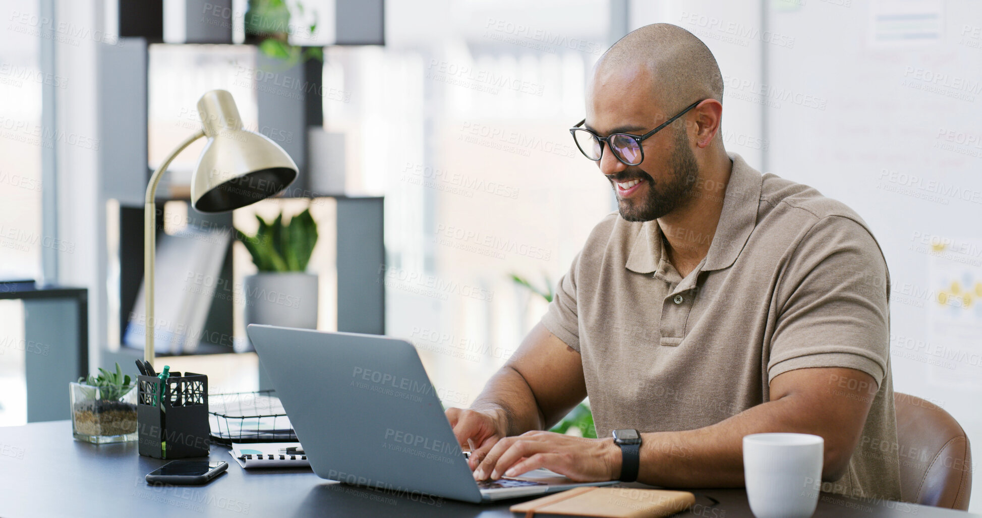 Buy stock photo Office, employee and man with laptop, typing and smile for troubleshooting, glasses and code review. Business, software engineer and person with reflection on eyewear, happy and cybersecurity on web