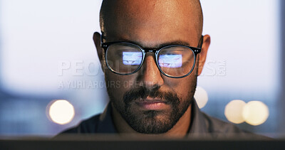 Buy stock photo Night, laptop and man with glasses, office or research for troubleshooting, online or cybersecurity. Working late, software engineer and person with reflection on eyewear, code review and bokeh