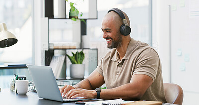 Buy stock photo Laptop, happy and man with headphones in office with music, playlist or podcast for creative project. Audio tech, computer and person streaming album and typing for article with publishing at agency.