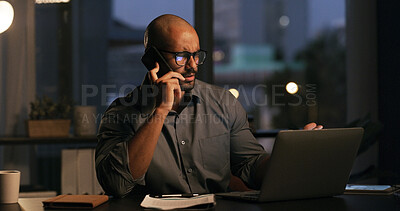 Buy stock photo Phone call, confused and man with laptop, office and review of tax issue on website, talk and night. Financial advisor, discussion or person with mobile for communication, frustrated and working late