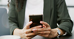 Phone, text and hands of business woman in office for investment app, communication and account review. Contact, online portfolio and trading website with employee in agency for scroll and chat