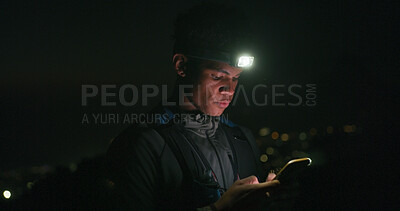 Buy stock photo Headlamp, hiking and phone with black man in dark to search for directions to destination or location. App, map and night with hiker outdoor for adventure, journey navigation or travel coordinates