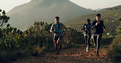 Buy stock photo Active, fitness and group running on mountain trail for marathon practice, endurance and exercise. Cardio club, people and jogging in nature for pace training, sports performance or workout challenge