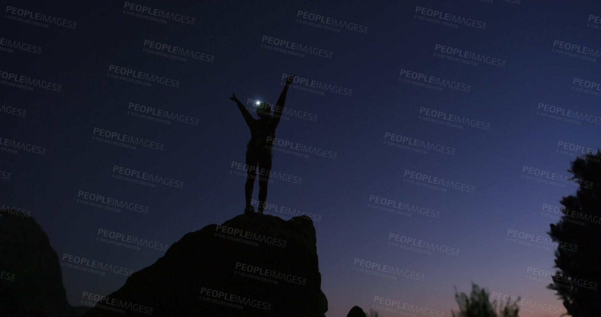 Buy stock photo Person, silhouette and night with celebration on mountain for conquer, achievement or milestone. Active, hiker and winning in late evening for workout goal or accomplishment on rock, cliff or space