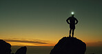 Night, rock climber and silhouette in nature, adventure and person on cliff with headlamp and space. Outdoor, hiking and athlete on mountain for fitness, sunset and light for exploration in dark