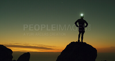 Buy stock photo Night, rock climber and silhouette in nature, adventure and person on cliff with headlamp and space. Outdoor, hiking and athlete on mountain for fitness, sunset and light for exploration in dark
