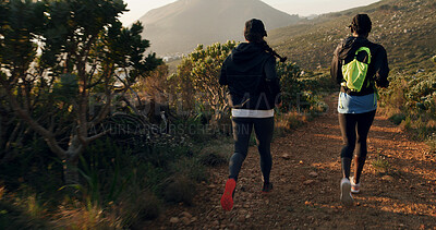 Buy stock photo Fitness, back of women and running on mountain trail for marathon practice, endurance and exercise. Cardio club, team and jogging in nature for pace training, sports performance and workout challenge
