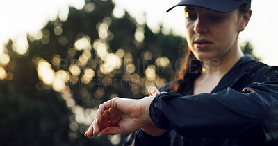 Buy stock photo Smart watch, outdoor and woman with fitness, training and tracking progress with wellness. Healthy person, runner and athlete with exercise, nature or digital app for heart rate, iot clock or monitor